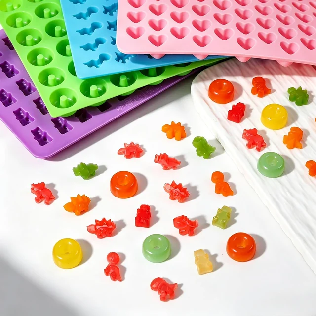 Candy shapes beside their four silicone molds