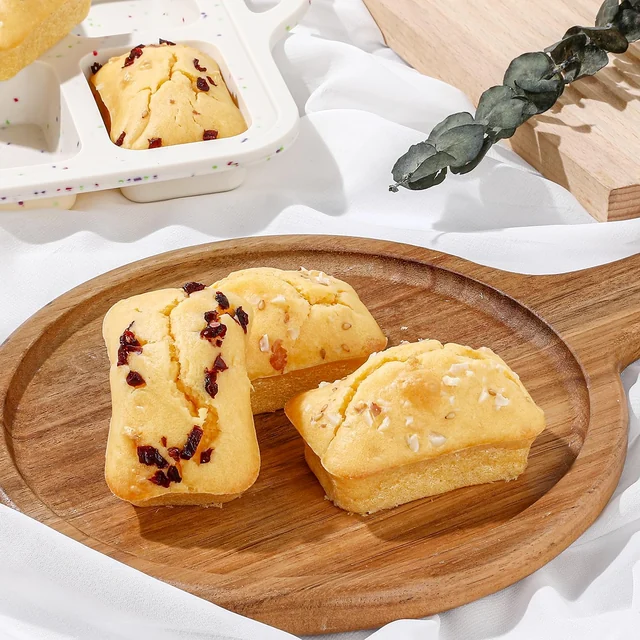 Sliced mini loaves beside the confetti pan